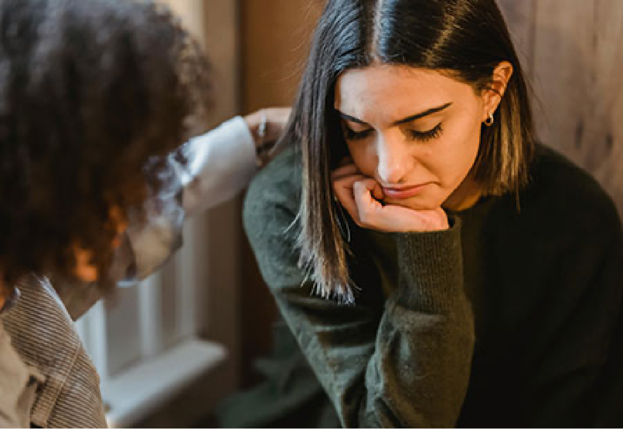 A girl contemplating during a therapy session